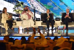 Saudi Crown Prince Mohammed bin Salman (2ND L), US journalist Maria Bartiromo (L), Masayoshi Son (3RD l), the Chief Executive Officer of SoftBank and Stephen Shwarzman, CEO of the Blackstone Group, attend the Future Investment Initiative (FII) conference in Riyadh, on October 24, 2017.