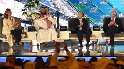 Saudi Crown Prince Mohammed bin Salman (2ND L), US journalist Maria Bartiromo (L), Masayoshi Son (3RD l), the Chief Executive Officer of SoftBank and Stephen Shwarzman, CEO of the Blackstone Group, attend the Future Investment Initiative (FII) conference in Riyadh, on October 24, 2017. The Crown Prince pledged a "moderate, open" Saudi Arabia, breaking with ultra-conservative clerics in favour of an image catering to foreign investors and Saudi youth.  "We are returning to what we were before -- a country of moderate Islam that is open to all religions and to the world," he said at the economic forum in Riyadh.