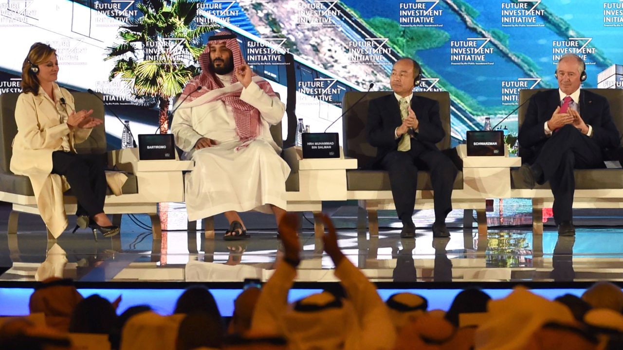 Saudi Crown Prince Mohammed bin Salman (2ND L), US journalist Maria Bartiromo (L), Masayoshi Son (3RD l), the Chief Executive Officer of SoftBank and Stephen Shwarzman, CEO of the Blackstone Group, attend the Future Investment Initiative (FII) conference in Riyadh, on October 24, 2017.