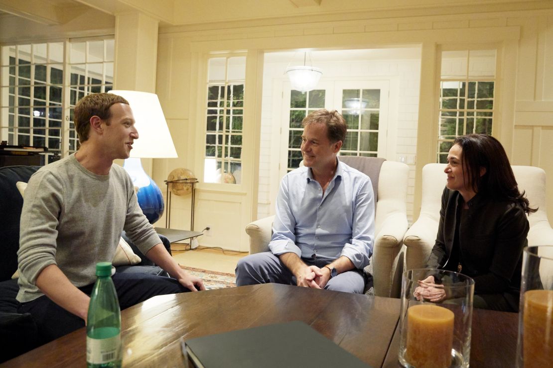 An undated handout from Facebook shows Zuckerberg and Sandberg meeting with Clegg. 