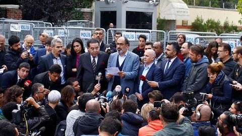 Turan Kislakci, head of the Turkish-Arab Media Association, talks to the media in front of Saudi Arabia's consulate in Istanbul.