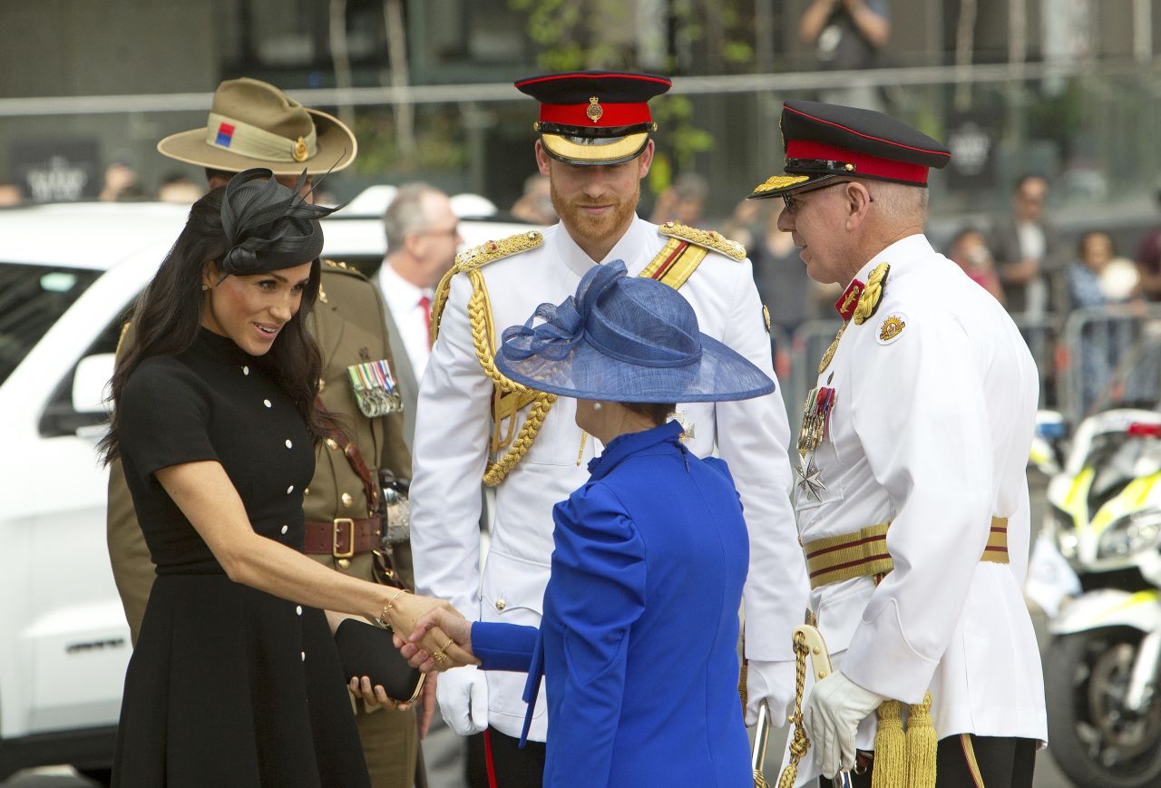 Harry and Meghan speak with Governor of New South Wales David Hurley and his wife, Linda Hurley, before attending the opening of the enhanced ANZAC Memorial in Sydney.