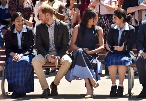 Harry and Meghan watch a performance during their visit on Friday, October 19, to Macarthur Girls High School near Sydney.