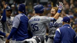 MILWAUKEE, WI - OCTOBER 20:  Cody Bellinger #35 of the Los Angeles Dodgers celebrates with his teammates after hitting a two run home run against Jhoulys Chacin #45 of the Milwaukee Brewers during the second inning in Game Seven of the National League Championship Series at Miller Park on October 20, 2018 in Milwaukee, Wisconsin.  (Photo by Jonathan Daniel/Getty Images)