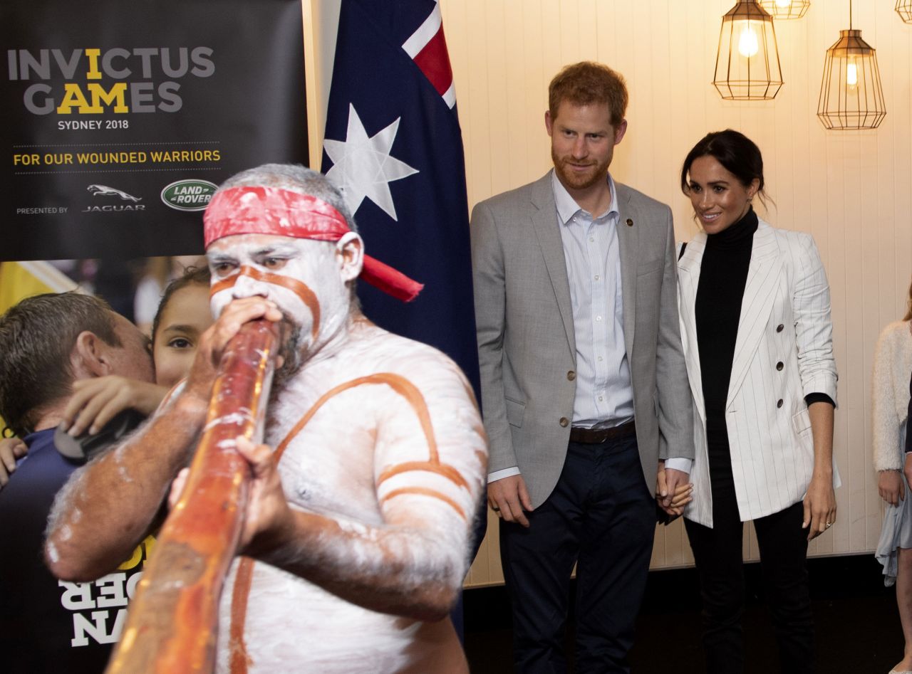 Britain's Prince Harry and Meghan, the Duchess of Sussex, attend a lunchtime reception hosted by Prime Minister Scott Morrison in Sydney, Australia, on Sunday.