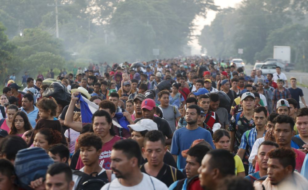 Central American migrants walking to the United States continue their journey, departing Ciudad Hidalgo, Mexico, on Sunday.