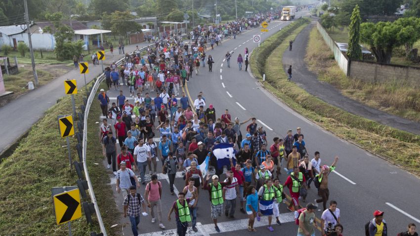 Central American migrants walking to the U.S. start their day departing Ciudad Hidalgo, Mexico, Sunday, October 21.