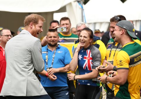 Prince Harry meets Australian athlete Ben Yeomans during the Invictus Games Cycling at the Royal Botanical Gardens on Sunday in Sydney.