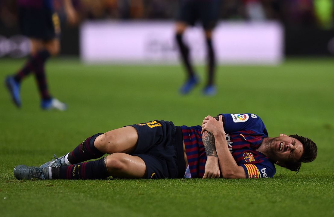 Lionel Messi landed heavily on his right arm after colliding with an opponent.   