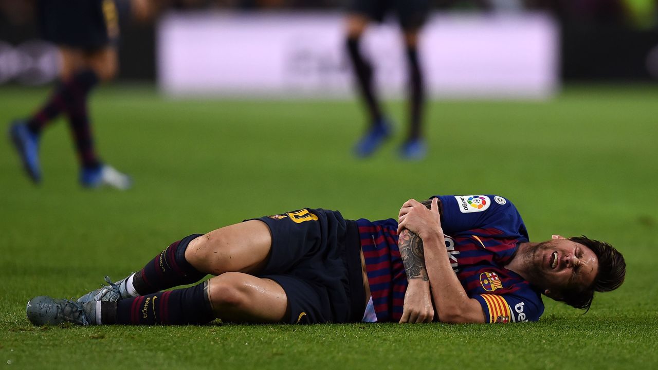 Lionel Messi landed heavily on his right arm after colliding with an opponent.   