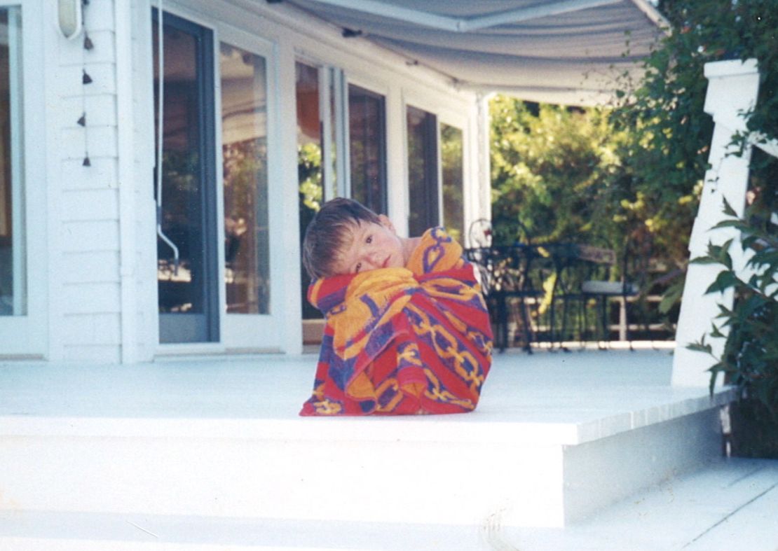 John Sarcona as a young boy, before his severe scoliosis developed.