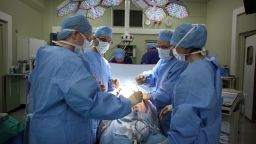 BIRMINGHAM, ENGLAND - MARCH 16: A surgeon and his theatre team perform key hole surgery to remove a gallbladder at at The Queen Elizabeth Hospital on March 16, 2010 in Birmingham, England. 