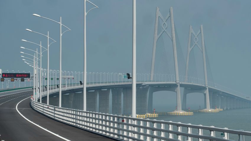 A general view of a section of the Hong Kong-Zhuhai-Macau Bridge in Zhuhai on March 28, 2018. - Officials say the bridge, billed as the world's longest sea bridge connecting Hong Kong, Macau and mainland China, will boost business and cut travel time, but opponents in Hong Kong see it as another attempt by Beijing to tighten its grip on the semi-autonomous city. (Photo by Philip FONG / AFP)        (Photo credit should read PHILIP FONG/AFP/Getty Images)