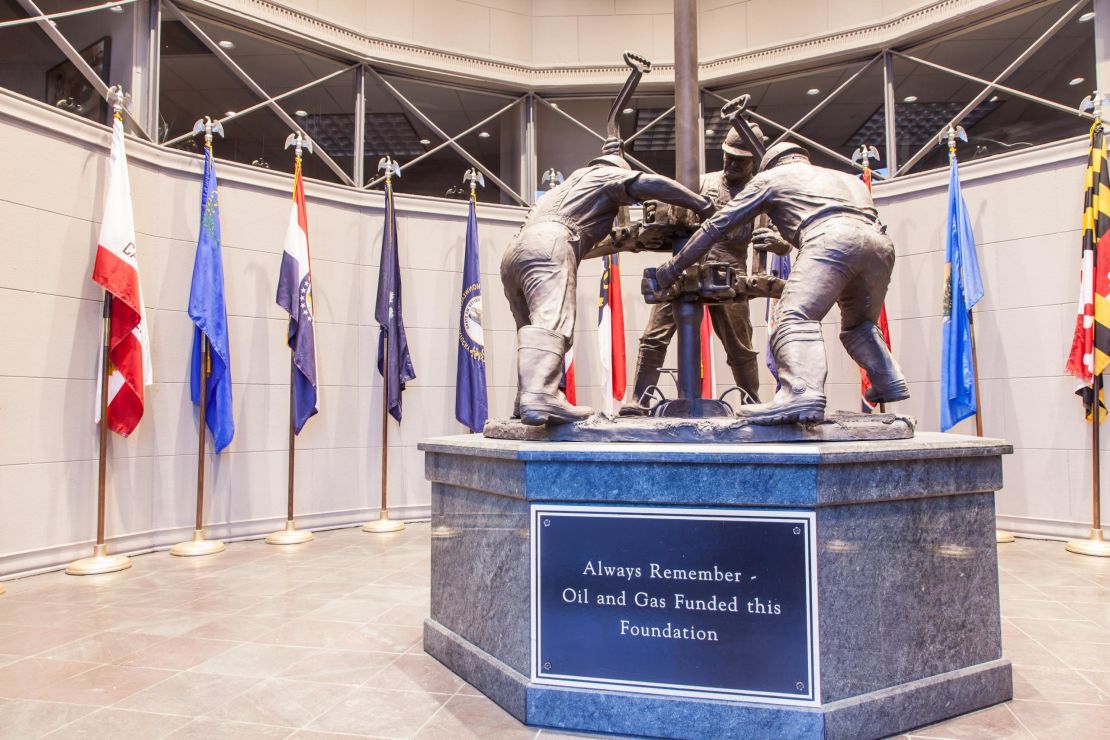 A statue commemorates the Patrick F. Taylor Foundation, the charitable extension of Taylor Energy Company.