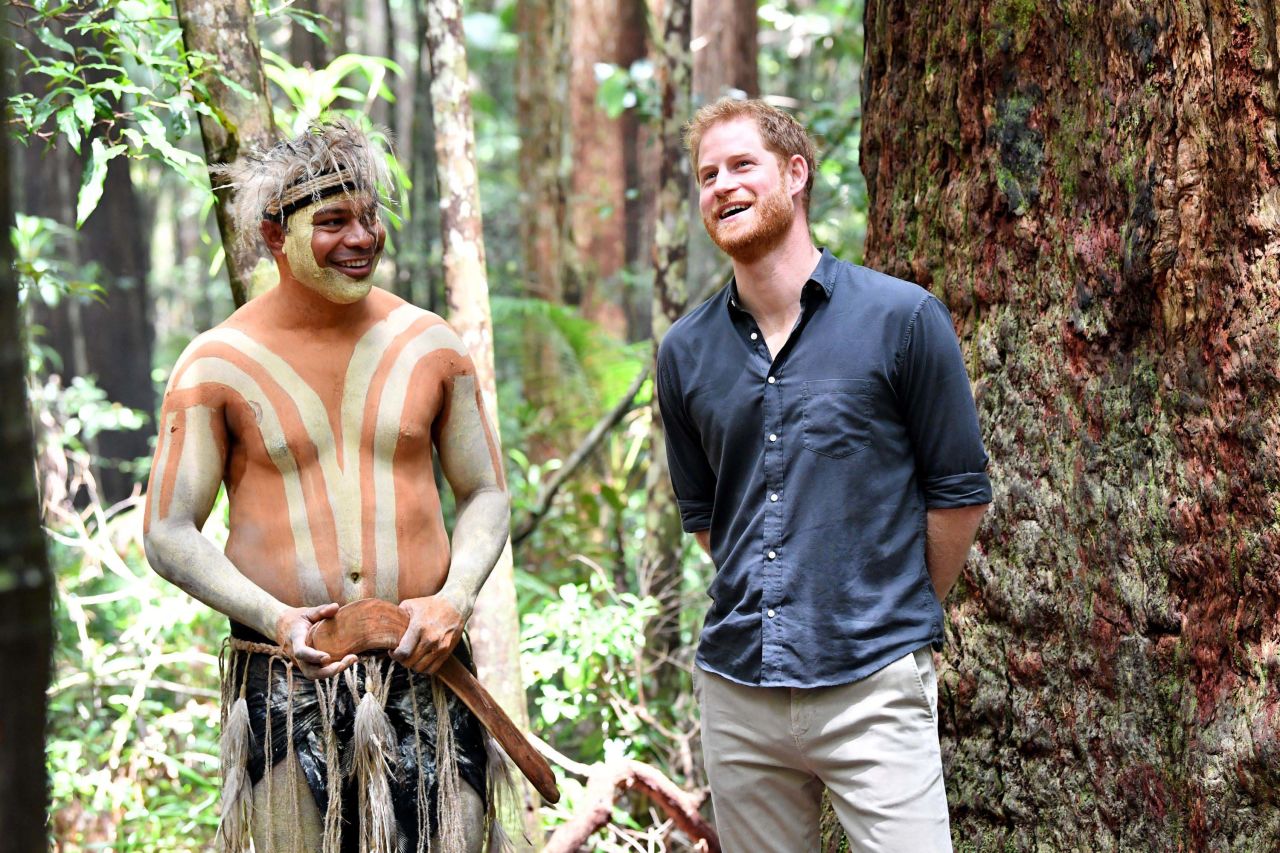 Harry talks with a member of the Butchulla people, who are the traditional owners of Fraser Island, at Pile Valley on Fraser Island, Australia, on Monday, October 22.