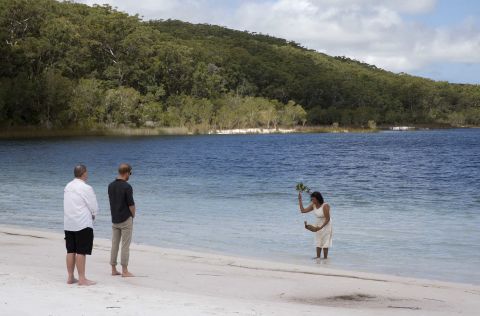 Prince Harry takes part in an aboriginal cleansing ceremony at Lake McKenzie on Fraser Island.