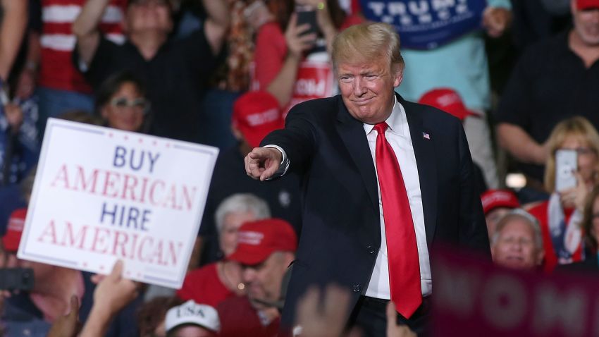 MESA, AZ - OCTOBER 19:  President Donald Trump points to a supporter during a rally at the International Air Response facility on October 19, 2018 in Mesa, Arizona.  President Trump is holding rallies in Arizona, Montana and Nevada, campaigning for Republican candidates running for the U.S. Senate. (Photo by Ralph Freso/Getty Images)