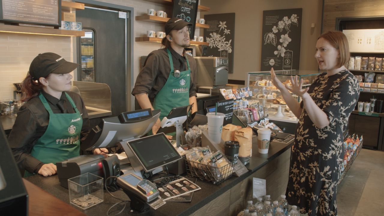 Baristas and CNN's Lilit Marcus chat in ASL.