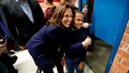 U.S. Sen. Kamala Harris, D-Calif., hugs eight-year-old Manaath Kai, of Des Moines, Iowa, after a get out the vote rally, Monday, Oct. 22, 2018, at Des Moines Area Community College in Ankeny, Iowa. (AP Photo/Charlie Neibergall)