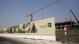 Cranes operate at the construction site of a new building project at the Saudi Aramco compound in Dhahran, Saudi Arabia.