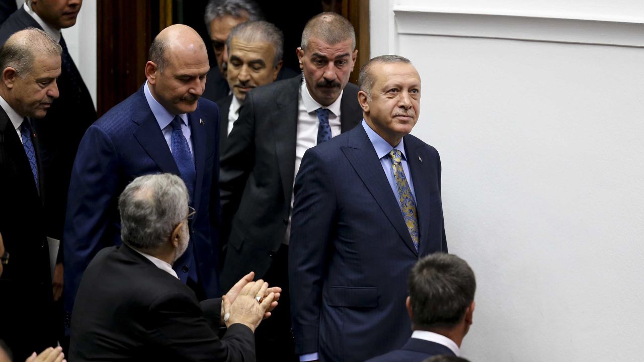 Erdogan is applauded inside the Turkish parliament in Ankara.