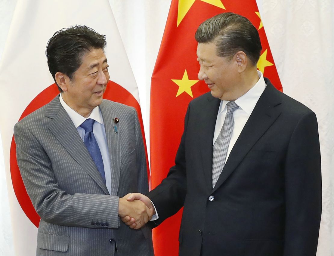 A much warmer handshake between Abe and Xi prior to their bilateral meeting in Vladivostok on September 12.