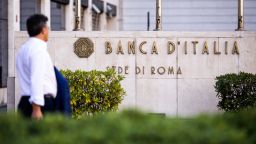 A pedestrian passes Banca d'Italia, Italy's central bank.