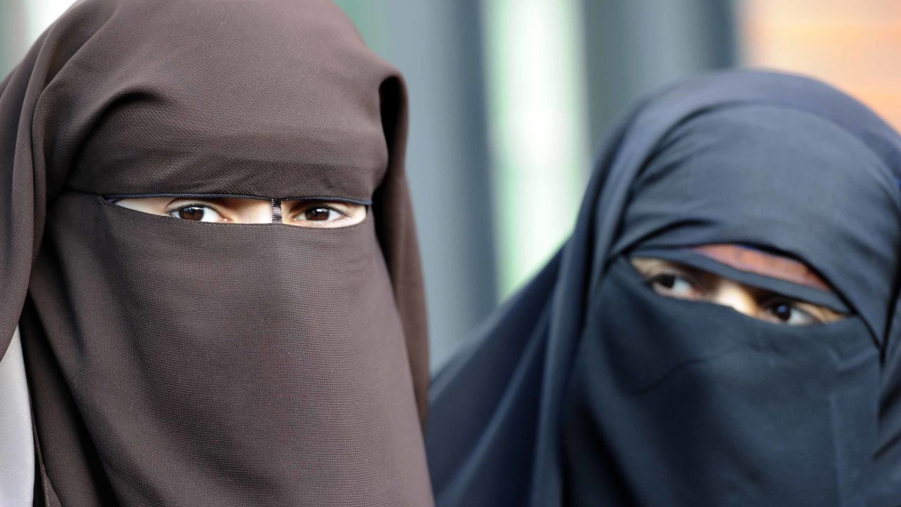 Kenza Drider (right) ran in the 2012 French presidential election after being fined for violating the ban. She has been a high-profile critic of the country's stance on the niqab. 