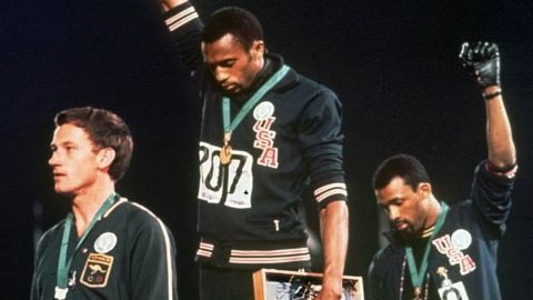 Peter Norman was vilified after he stood with Tommie Smith, center, and John Carlos at the 1968 Olympics.