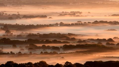 <strong>Amberley, United Kingdom</strong>: An enchanting mist fills lower-lying areas in South Downs National Park, which is in West Sussex near Amberly, England, in early October.