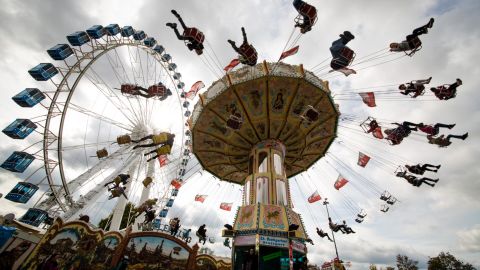 <strong>Stuttgart, Germany: </strong>Revelers ride a chain carousel at the 173rd Cannstatter Volksfest, a three-week long beer festival and fair. Stuttgart is in southwestern Germany, about a two-hour drive from the French border. 