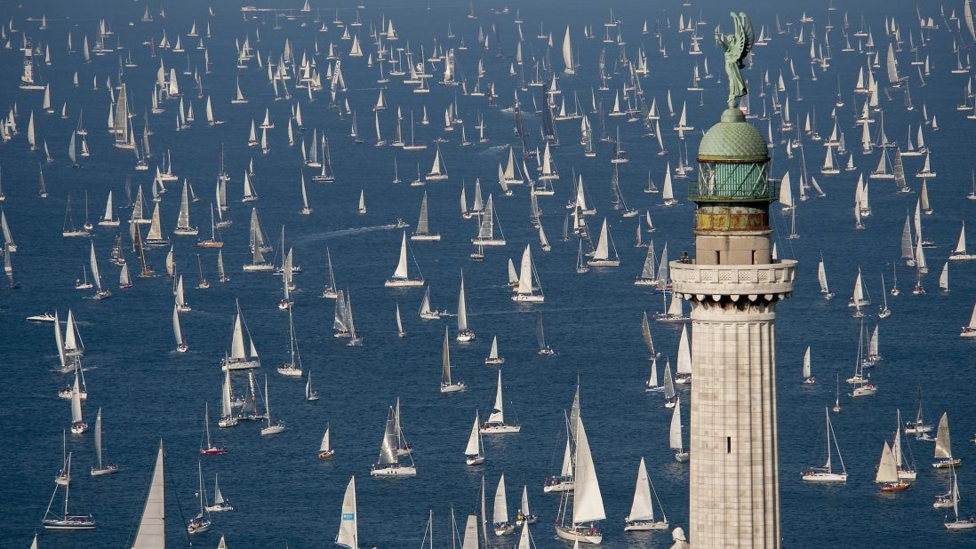 <strong>Trieste, Italy: </strong>At the 50th Barcolana regatta in Trieste, Italy, boats sail past the Victory Lighthouse. This historic regatta is held annually on the second Sunday of October. 