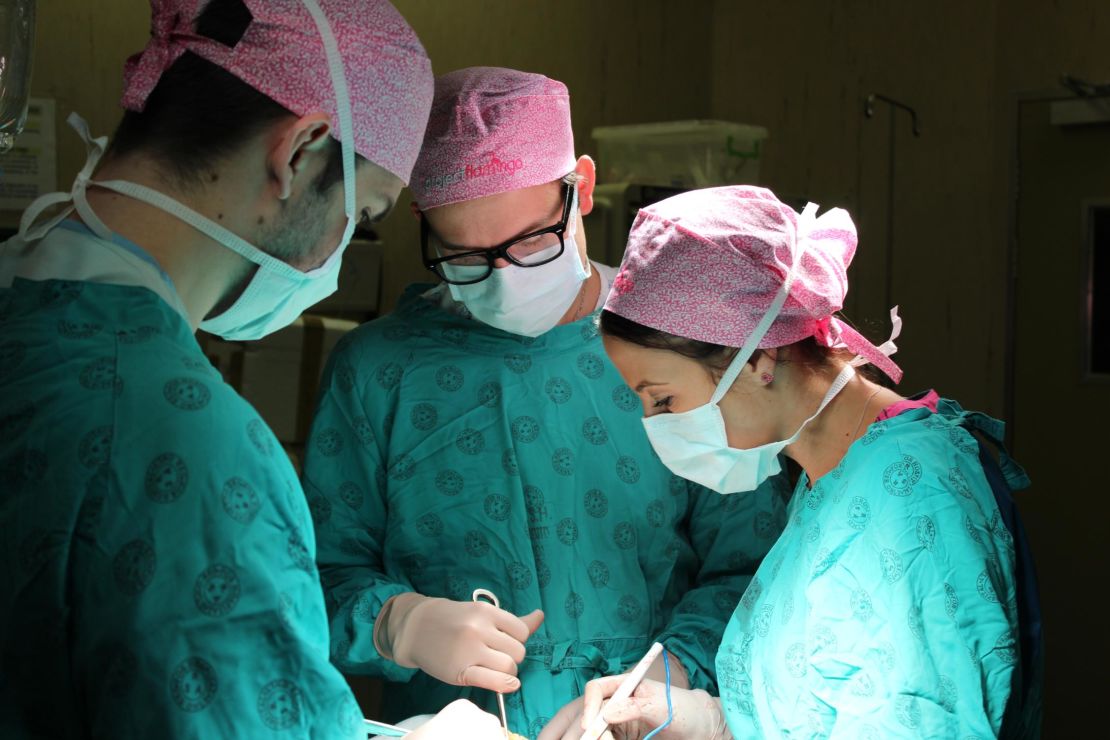 Dr Liana Roodt operating on a patient and assisted by Dr Michael Brombacher.