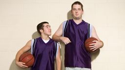 Tall and short basketball players; Shutterstock ID 383817286; Job: -