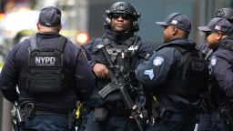Members of the New York Police Department Counter Terroism Squad are pictured outside the Time Warner Center in the Manahattan borough of New York City after a suspicious package was found inside the CNN Headquarters in New York.