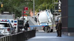 An NYPD bomb squad vehicle departs an area outside Time Warner Center on Wednesday, Oct. 24, 2018, in New York. Law enforcement officials say a suspicious package that prompted an evacuation of CNN's offices is believed to contain a pipe bomb. (AP Photo/Kevin Hagen)