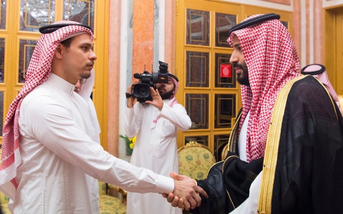 Saudi Crown Prince Mohammed bin Salman, right, shakes hands with Salah bin Jamal Khashoggi at Al Yamama Palace in Riyadh on Tuesday.