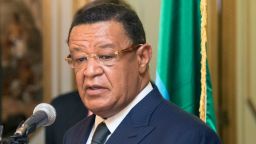 Ethiopian President, Mulatu Teshome, speaks beside the covered FIFA trophy at the National Palace of Ethiopia Addia Ababa on February 24, 2018, part of the football organisation's world trophy tour.