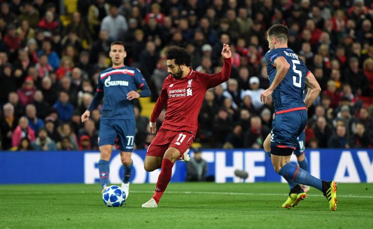 Mohamed Salah scores his first and Liverpool's second in a comfortable 4-0 victory over Red Star Belgrade. 