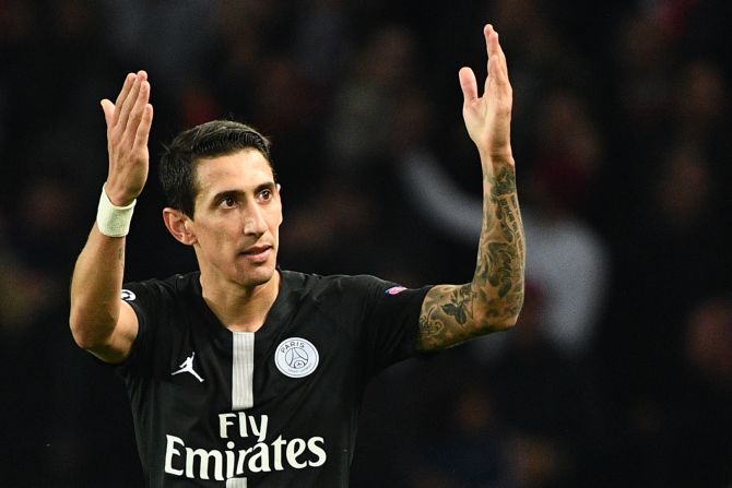 Angel Di Maria celebrates scoring a wonderful goal in the last minute of PSG's match against Napoli. The Argentine saved his side's blushes with the dramatic equalizer which tied the scores at 2-2. 