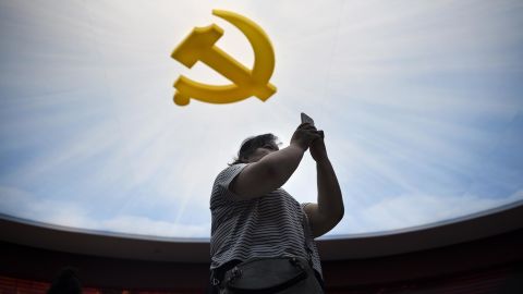 The Communist Party's hammer and sickle logo at a museum in Beijing. Once hesitant to advertise political connections, China's tech giants are now increasingly promoting their ties to the party.
