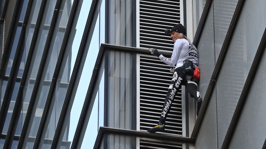French urban climber Alain Robert, also known as "Spider-Man", climbs Heron Tower, 110 Bishopsgate, in central London on October 25, 2018, the tallest tower in the city of London.