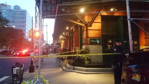 A police officer blocks off an area in Manhattan Thursday morning after a suspicious package addressed to Robert De Niro was reported at the Tribeca Enterprises building.