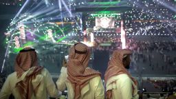 Fans film the opening of the "Greatest Royal Rumble" event in Jiddah, Saudi Arabia, Friday, April 27, 2018.