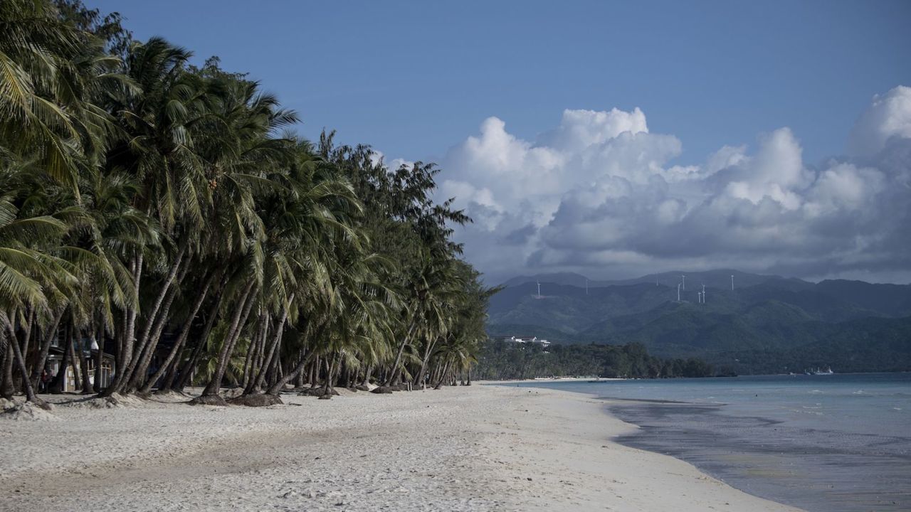 This general shot shows a beach on the Philippine island of Boracay on October 25, 2018. The Philippines re-opened its crown jewel resort island Boracay to holidaymakers on October 26, after a six-month clean up aimed at repairing the damage inflicted by years of unrestrained mass tourism. 