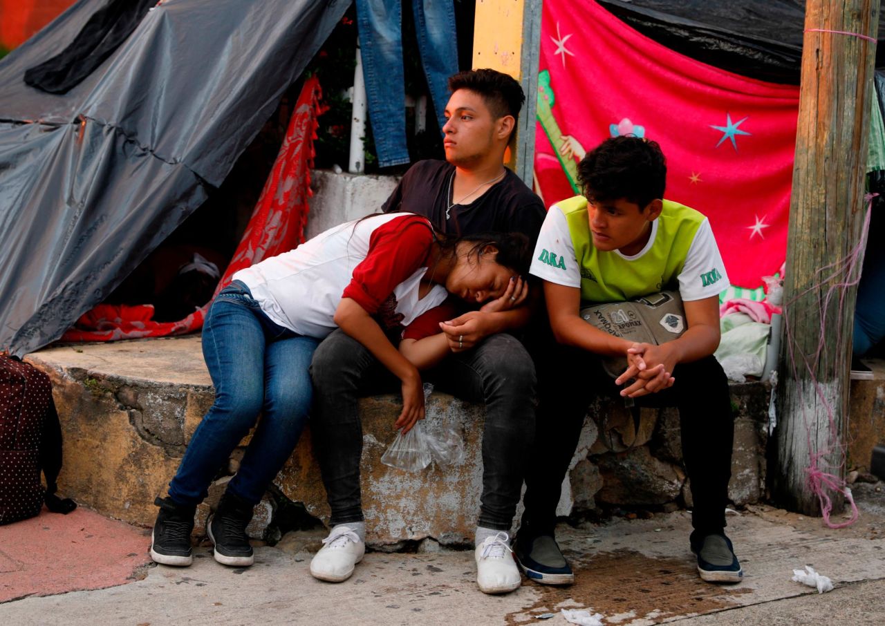 Central American migrants rest for the night in Pijijiapan, Mexico, on Thursday, October 25.