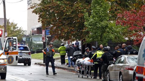First responders surround the Tree of Life Synagogue where a shooter opened fire Saturday, Oct. 27, 2018. (AP Photo/Gene J. Puskar)