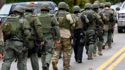 Rapid reaction SWAT members leave the scene of a mass shooting at the Tree of Life Synagogue in the Squirrel Hill neighborhood on October 27, 2018 in Pittsburgh, Pennsylvania.