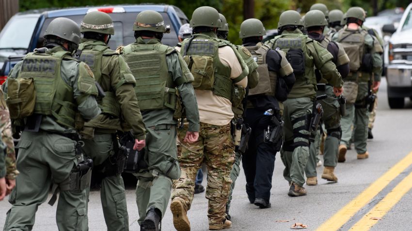 Rapid reaction SWAT members leave the scene of a mass shooting at the Tree of Life Synagogue in the Squirrel Hill neighborhood on October 27, 2018 in Pittsburgh, Pennsylvania.