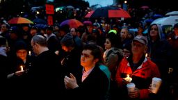 People hold candles as they gather for a vigil in the aftermath of a deadly shooting at the Tree of Life Synagogue, in the Squirrel Hill neighborhood of Pittsburgh, Saturday, Oct. 27, 2018. (AP Photo/Matt Rourke)
